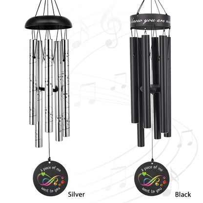 Two pet wind chimes in silver and black colors