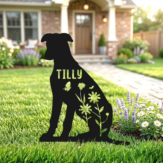 Custom metal sitting dog sign in a front garden