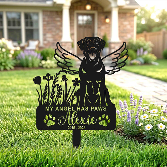 Memorial pet wing sign placed in a green backyard